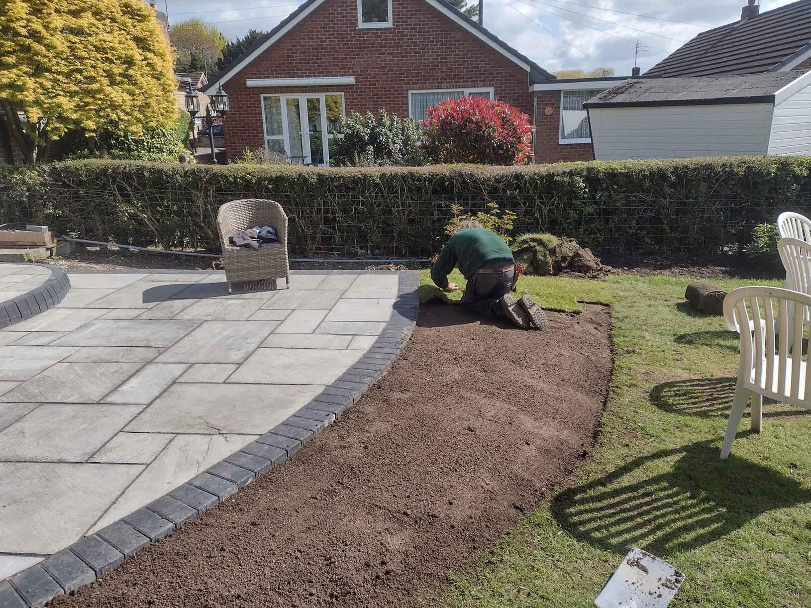 Paving and laying turf